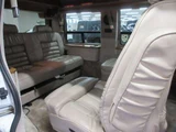 1999 Chevrolet Astro Starcraft Coach High Roof 2WD, Authorized Dealer Vehicle, Navigation System White Sedan for sale, Japanese used car export - photo 24 of 47 | GULJI TRADERS