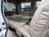 1999 Chevrolet Astro Starcraft Coach High Roof 2WD, Authorized Dealer Vehicle, Navigation System White Sedan for sale, Japanese used car export - photo 25 of 47 | GULJI TRADERS