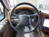 1999 Chevrolet Astro Starcraft Coach High Roof 2WD, Authorized Dealer Vehicle, Navigation System White Sedan for sale, Japanese used car export - photo 26 of 47 | GULJI TRADERS