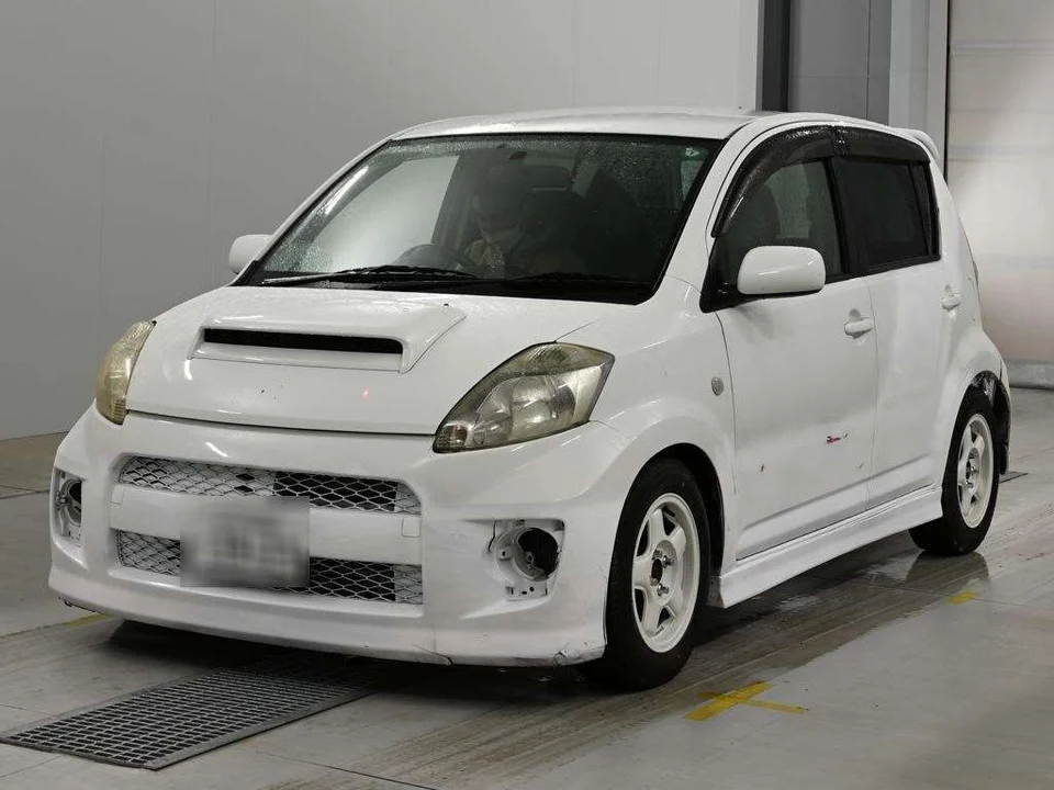 2007 Daihatsu Boon 4WD - photo 1 2007 Daihatsu Boon 4WD Sedan for sale, Japanese used car export - photo 1 of 12 | GULJI TRADERS