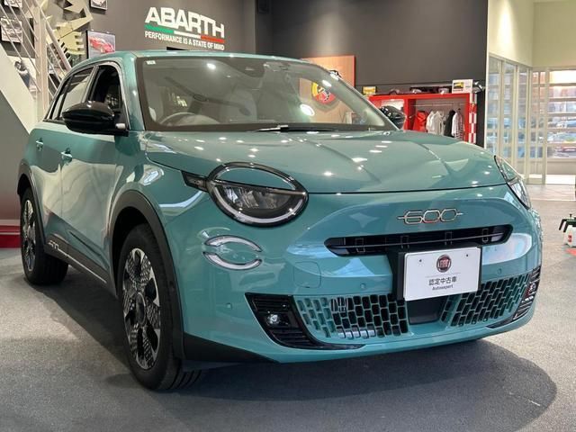 2025 Fiat 600 Hybrid - photo 1 2025 Fiat 600 Hybrid Sedan for sale, Japanese used car export - photo 1 of 9 | GULJI TRADERS