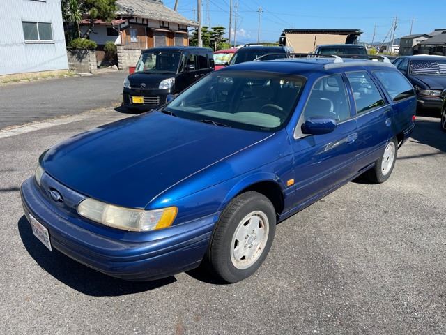 1994 Ford Taurus GL - photo 1 1994 Ford Taurus GL Sedan for sale, Japanese used car export | GULJI TRADERS