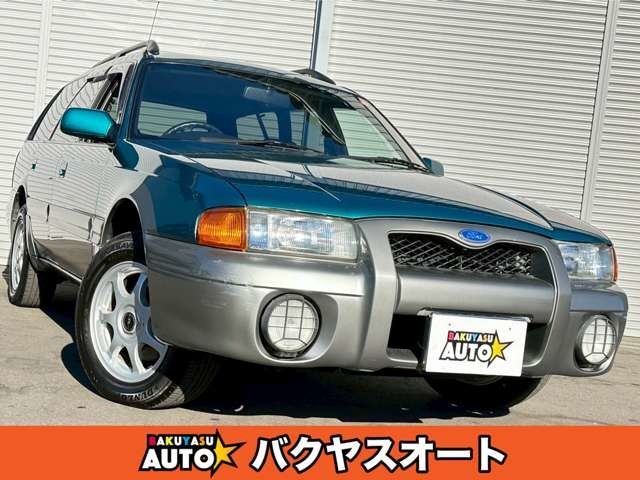 1996 Ford Telstar Wagon 20i-X Canoa 4WD - photo 1 1996 Ford Telstar Wagon 20i-X Canoa 4WD Green Van for sale, Japanese used car export - photo 1 of 48 | GULJI TRADERS