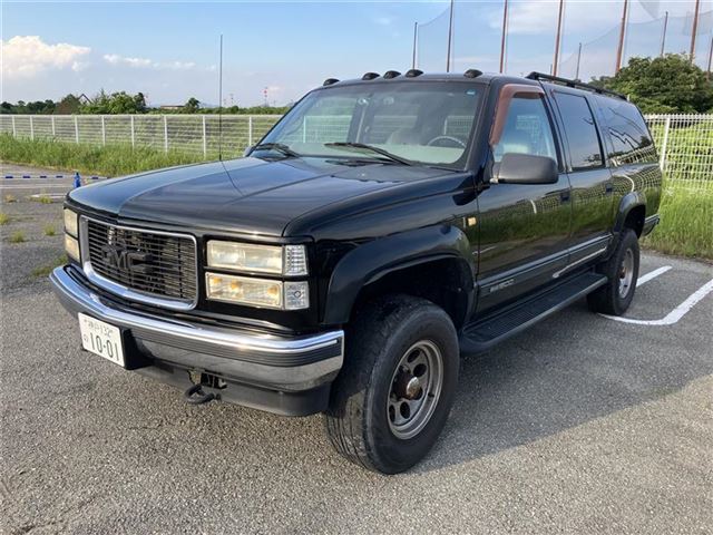 2002 GMC Suburban K1500SLE - photo 1 2002 GMC Suburban K1500SLE SUV for sale, Japanese used car export | GULJI TRADERS