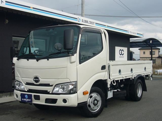 2024 Hino Dutro Low-floor 2-ton truck with automatic transmission, navigation system, digital inner mirrors, and steel plate bed. White Truck for sale, Japanese used car export - photo 1 of 20 | GULJI TRADERS