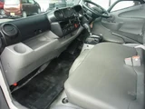2024 Hino Dutro Low-floor 2-ton truck with automatic transmission, navigation system, digital inner mirrors, and steel plate bed. White Truck for sale, Japanese used car export - photo 3 of 20 | GULJI TRADERS