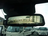 2024 Hino Dutro Low-floor 2-ton truck with automatic transmission, navigation system, digital inner mirrors, and steel plate bed. White Truck for sale, Japanese used car export - photo 10 of 20 | GULJI TRADERS