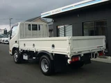2024 Hino Dutro Low-floor 2-ton truck with automatic transmission, navigation system, digital inner mirrors, and steel plate bed. White Truck for sale, Japanese used car export - photo 15 of 20 | GULJI TRADERS