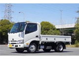 2024 Hino Dutro 2t flatbed truck, low-floor, automatic transmission. White Truck for sale, Japanese used car export - photo 1 of 50 | GULJI TRADERS