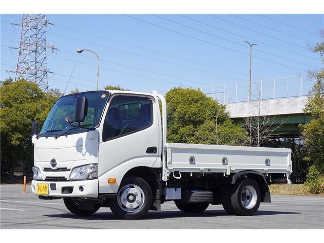 2024 Hino Dutro 2t flatbed truck, low-floor, automatic transmission. White Truck for sale, Japanese used car export - photo 1 of 50 | GULJI TRADERS