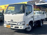 2025 Hino Dutro 2-ton flatbed truck, mitigation braking system, backup camera, 6-speed manual transmission, registered but unused. White Truck for sale, Japanese used car export - photo 1 of 43 | GULJI TRADERS