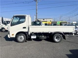 2025 Hino Dutro 2-ton flatbed truck, mitigation braking system, backup camera, 6-speed manual transmission, registered but unused. White Truck for sale, Japanese used car export - photo 3 of 43 | GULJI TRADERS