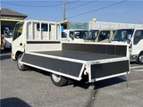 2025 Hino Dutro 2-ton flatbed truck, mitigation braking system, backup camera, 6-speed manual transmission, registered but unused. White Truck for sale, Japanese used car export - photo 7 of 43 | GULJI TRADERS
