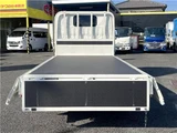 2025 Hino Dutro 2-ton flatbed truck, mitigation braking system, backup camera, 6-speed manual transmission, registered but unused. White Truck for sale, Japanese used car export - photo 8 of 43 | GULJI TRADERS