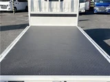 2025 Hino Dutro 2-ton flatbed truck, mitigation braking system, backup camera, 6-speed manual transmission, registered but unused. White Truck for sale, Japanese used car export - photo 9 of 43 | GULJI TRADERS