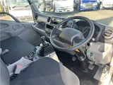2025 Hino Dutro 2-ton flatbed truck, mitigation braking system, backup camera, 6-speed manual transmission, registered but unused. White Truck for sale, Japanese used car export - photo 12 of 43 | GULJI TRADERS