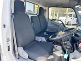 2025 Hino Dutro 2-ton flatbed truck, mitigation braking system, backup camera, 6-speed manual transmission, registered but unused. White Truck for sale, Japanese used car export - photo 13 of 43 | GULJI TRADERS