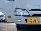 2025 Hino Dutro 2-ton flatbed truck, mitigation braking system, backup camera, 6-speed manual transmission, registered but unused. White Truck for sale, Japanese used car export - photo 26 of 43 | GULJI TRADERS