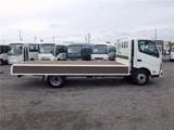 2025 Hino Dutro Flatbed wide extra-long 4.5t registered unused vehicle, current model. White Truck for sale, Japanese used car export - photo 7 of 51 | GULJI TRADERS