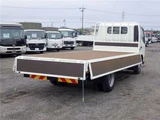 2025 Hino Dutro Flatbed wide extra-long 4.5t registered unused vehicle, current model. White Truck for sale, Japanese used car export - photo 10 of 51 | GULJI TRADERS