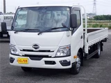 2025 Hino Dutro Flatbed wide-long 2t truck, unused, current model, 6-speed manual transmission, low-floor. White Truck for sale, Japanese used car export - photo 1 of 51 | GULJI TRADERS