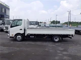 2025 Hino Dutro Flatbed wide-long 2t truck, unused, current model, 6-speed manual transmission, low-floor. White Truck for sale, Japanese used car export - photo 3 of 51 | GULJI TRADERS