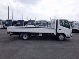 2025 Hino Dutro Flatbed wide-long 2t truck, unused, current model, 6-speed manual transmission, low-floor. White Truck for sale, Japanese used car export - photo 4 of 51 | GULJI TRADERS