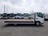 2025 Hino Dutro Flatbed wide-long 2t truck, unused, current model, 6-speed manual transmission, low-floor. White Truck for sale, Japanese used car export - photo 26 of 51 | GULJI TRADERS