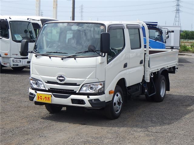 2025 Hino Dutro Double cab, 4WD, flatbed, 2-ton, registered but unused vehicle, current model, 5-speed manual transmission. White Truck for sale, Japanese used car export - photo 1 of 51 | GULJI TRADERS