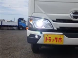 2025 Hino Dutro Double cab, 4WD, flatbed, 2-ton, registered but unused vehicle, current model, 5-speed manual transmission. White Truck for sale, Japanese used car export - photo 2 of 51 | GULJI TRADERS