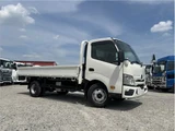 2025 Hino Dutro Flatbed truck with approximately 500km mileage. White Truck for sale, Japanese used car export - photo 4 of 29 | GULJI TRADERS