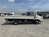 2025 Hino Dutro Flatbed truck with approximately 500km mileage. White Truck for sale, Japanese used car export - photo 10 of 29 | GULJI TRADERS