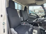 2025 Hino Dutro Flatbed truck with approximately 500km mileage. White Truck for sale, Japanese used car export - photo 11 of 29 | GULJI TRADERS