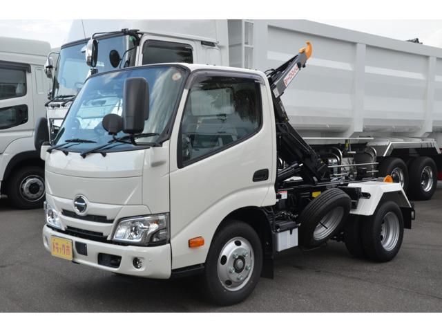 2025 Hino Dutro Far East Development 3t Hook Roll (Arm Roll) - photo 1 2025 Hino Dutro Far East Development 3t Hook Roll (Arm Roll) White Truck for sale, Japanese used car export - photo 1 of 24 | GULJI TRADERS