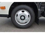 2025 Hino Dutro Far East Development 3t Hook Roll (Arm Roll) White Truck for sale, Japanese used car export - photo 14 of 24 | GULJI TRADERS