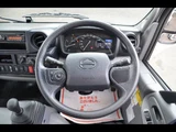 2025 Hino Dutro Far East Development 3t Hook Roll (Arm Roll) White Truck for sale, Japanese used car export - photo 19 of 24 | GULJI TRADERS