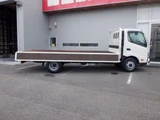 2025 Hino Dutro Flatbed White Truck for sale, Japanese used car export - photo 8 of 9 | GULJI TRADERS