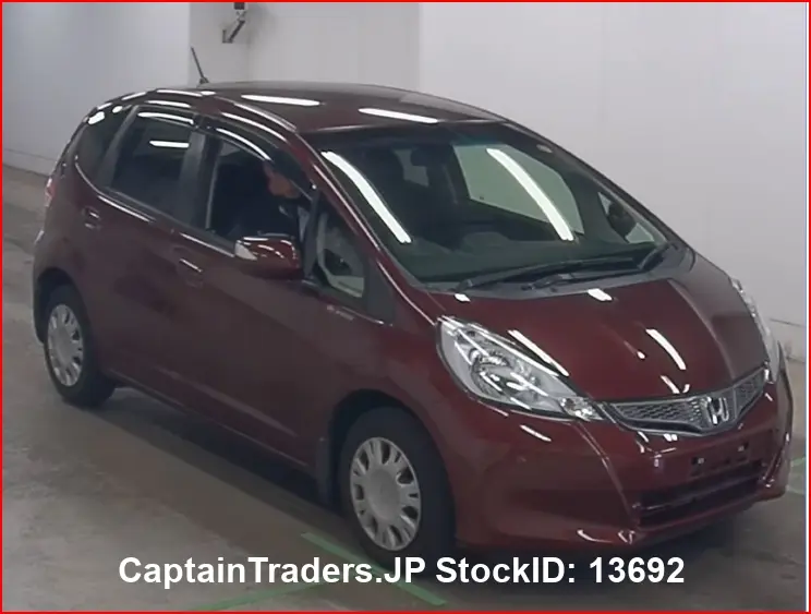 2012 Honda Fit Wine Sedan for sale, Japanese used car export - photo 1 of 7 | GULJI TRADERS