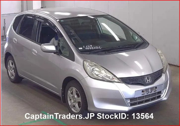 2013 Honda Fit - photo 1 2013 Honda Fit Silver Sedan for sale, Japanese used car export | GULJI TRADERS
