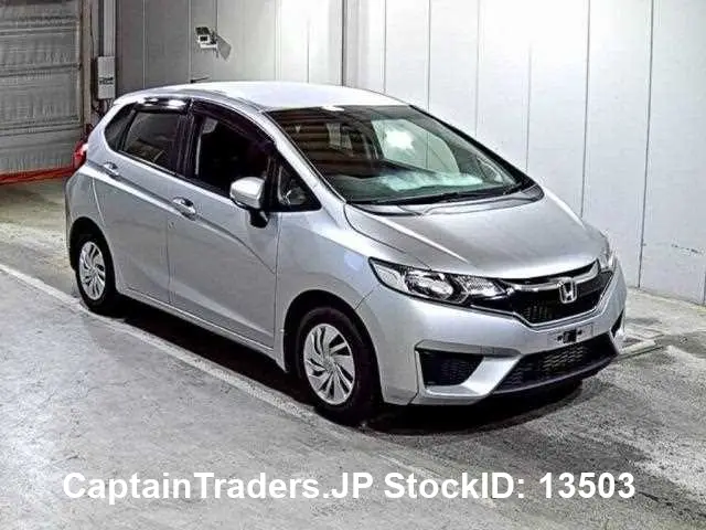 2015 Honda Fit - photo 1 2015 Honda Fit Silver Sedan for sale, Japanese used car export | GULJI TRADERS