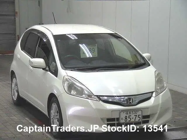 2012 Honda Fit Hibrid - photo 1 2012 Honda Fit Hibrid Pearl Sedan for sale, Japanese used car export | GULJI TRADERS