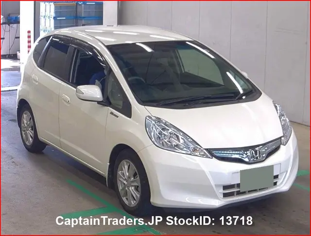 2012 Honda Fit Hibrid Pearl Sedan for sale, Japanese used car export | GULJI TRADERS