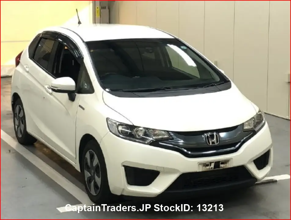 2015 Honda Fit Hibrid - photo 1 2015 Honda Fit Hibrid Pearl Sedan for sale, Japanese used car export - photo 1 of 23 | GULJI TRADERS