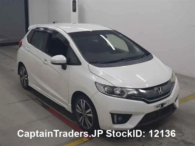 2015 Honda Fit Hibrid Pearl Sedan for sale, Japanese used car export | GULJI TRADERS