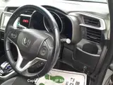 2017 Honda Fit Hibrid Silver Sedan for sale, Japanese used car export - photo 10 of 19 | GULJI TRADERS