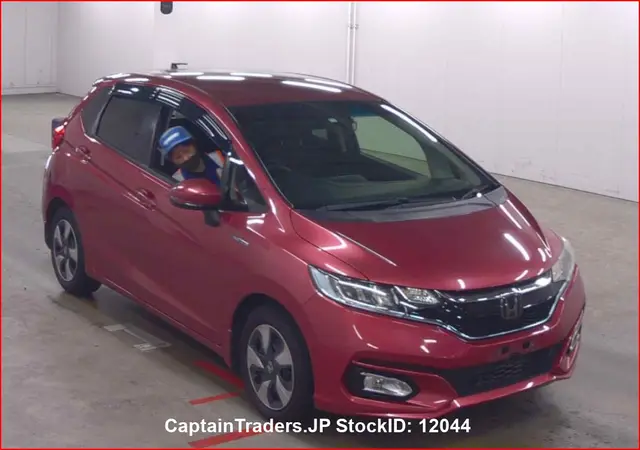 2018 Honda Fit Hibrid - photo 1 2018 Honda Fit Hibrid Wine Sedan for sale, Japanese used car export | GULJI TRADERS