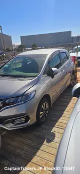 2018 Honda Fit Hibrid Silver Sedan for sale, Japanese used car export - photo 26 of 32 | GULJI TRADERS
