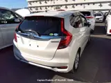 2018 Honda Fit Hibrid Pearl white Sedan for sale, Japanese used car export - photo 58 of 62 | GULJI TRADERS
