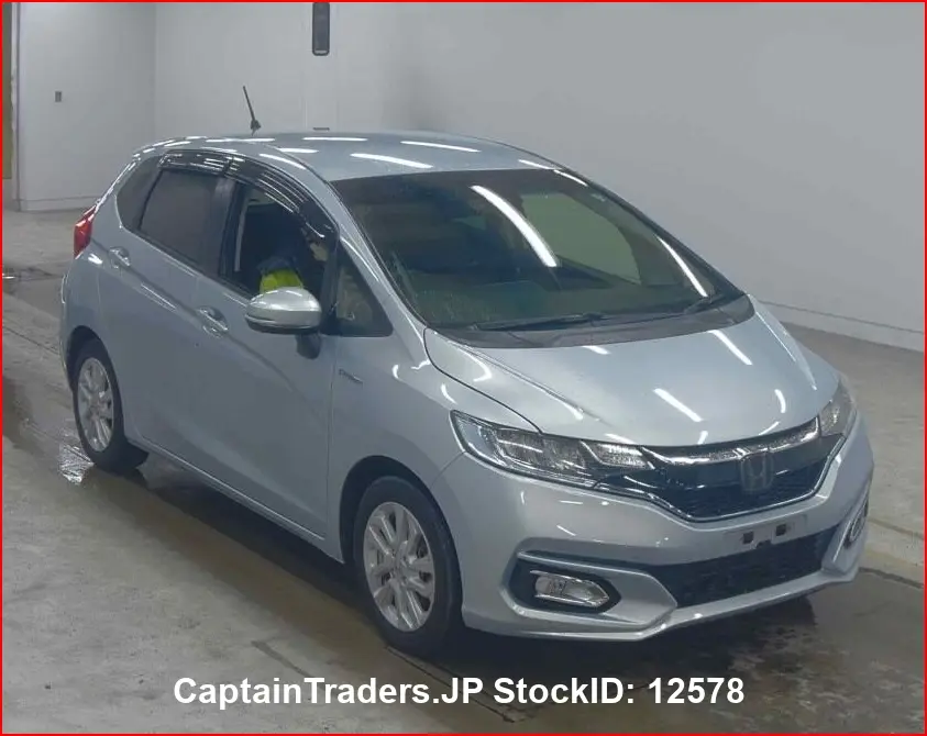 2018 Honda Fit Hibrid - photo 1 2018 Honda Fit Hibrid LIGHT BLUE Sedan for sale, Japanese used car export - photo 1 of 28 | GULJI TRADERS