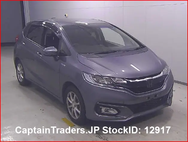 2018 Honda Fit Hibrid - photo 1 2018 Honda Fit Hibrid GRAY Sedan for sale, Japanese used car export | GULJI TRADERS